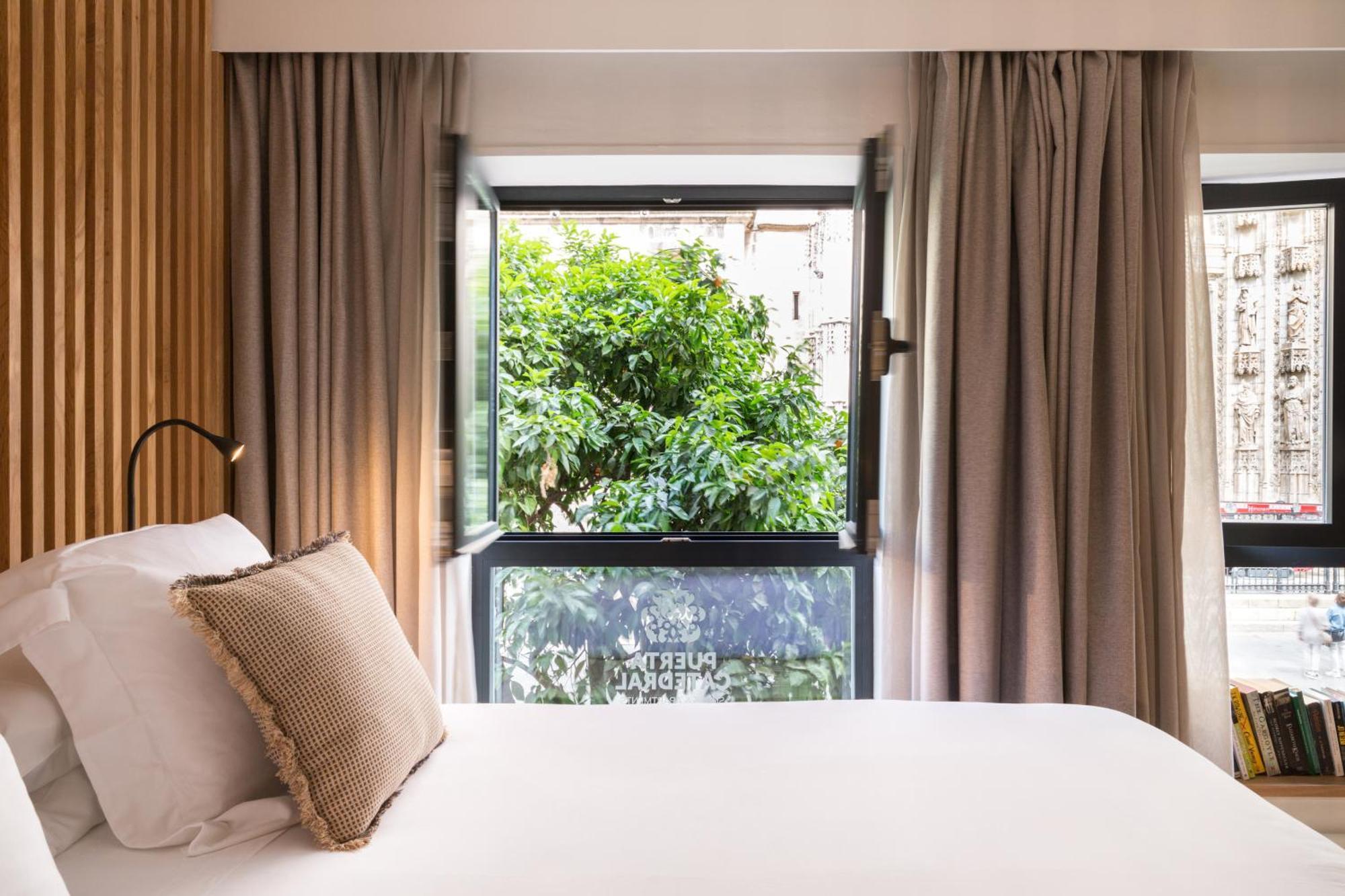Puerta Catedral Suites Sevilla Rom bilde